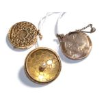 A 15 carat gold circular locket, measures 2.1cm diameter, a circular cultured pearl brooch,