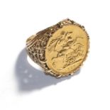 A 1909 full sovereign mounted as a ring, finger size Q. Ring stamped '9CT'. Gross weight 14.19