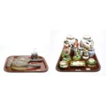 A three piece silver backed dressing table set, a scent bottle, a pair of Sitzendorf figures, a pair