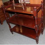 A late Victorian mahogany three tier dumb waiter