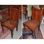 A pair of oak chairs