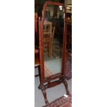 An early 20th century mahogany cheval mirror