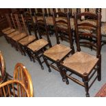 A set of four 19th century elm ladder back dining chairs together with another similar set of