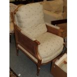 A Louis XVI style gilt and cane bergère chair . Good condition throughout the whole chair, the frame