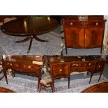 A reproduction large oval pedestal dining table in the Regency style, a serpentine shaped sideboard,