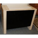 A modern travertine double door cabinet