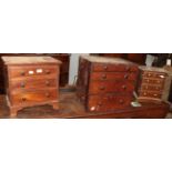 A Victorian mahogany four drawer chest and two reproduction miniature chests