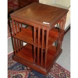 An Edwardian mahogany revolving bookcase