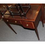 An Edwardian mahogany and cross banded desk