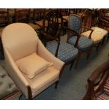 An early 20th century tub shaped armchair, two carver chairs and two dining chairs (5)