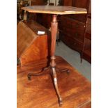 A late Victorian mahogany and satinwood cross banded tripod table