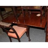 A Victorian Mahogany drop-leaf dining table, late 19th century, of rectangular form, the two