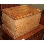 A small 19th century pine chest with hinged lid