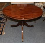 A Regency style brass inlaid pedestal breakfast table