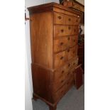 A George III walnut chest on chest, with moulded cornice above three short and six long drawers,
