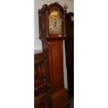 An oak eight day long case clock, signed John Collins, Wattisfield, circa 1780, arch brass dial