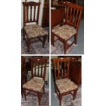 A set of six mahogany dining chairs, foliate splats and tapestry seats (6)