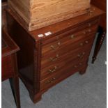 A mahogany cupboard with brushing slide in the form of a four drawer chest