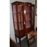 An Edwardian inlaid mahogany display cabinet