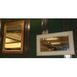 A Florentine style gilt frame bevelled glass mirror and a cream framed bevelled glass mirror