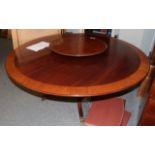 A William Tillman reproduction mahogany and cross banded circular dining table