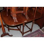 Oak gateleg dining table, small oak cabinet and an oak glazed bookcase (3)