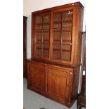 A late Victorian mahogany glazed bookcase