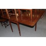 A George III mahogany drop leaf dining table