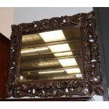 A Rococo style gesso mirror