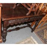 A Victorian carved oak hall table