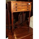 A Regency mahogany and ebony strung work table, the top drawer with a fitted interior