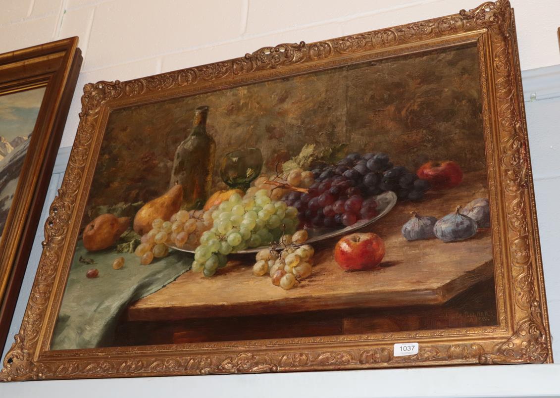 Joseph de Belder (1871-1927) Still life of fruit, signed, oil on board, 50cm by 80cm