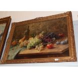 Joseph de Belder (1871-1927) Still life of fruit, signed, oil on board, 50cm by 80cm