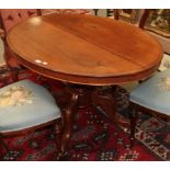 A Victorian pedestal loo table