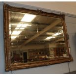 A refraction gilt bevel glass mirror