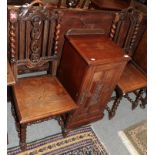 A Victorian oak beside cupboard with four carved oak dining chairs (5)