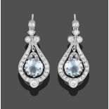 A Pair of Aquamarine and Diamond Drop Earrings, the round cut aquamarine in a white claw setting