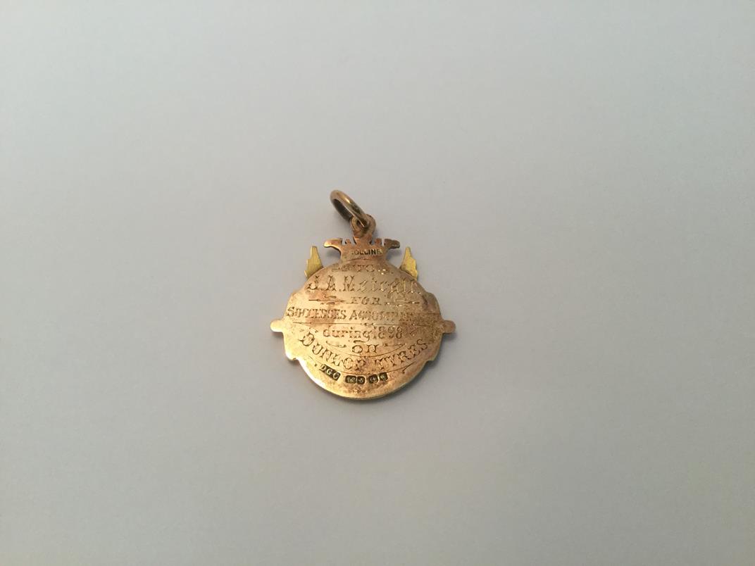 A Victorian Gold and Enamel Medal, by Daniel George Collins, Birmingham, 1897, 15ct, shaped as a - Image 2 of 3