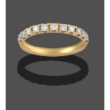 An 18 Carat Gold Diamond Half Hoop Ring, eleven round brilliant cut diamonds in yellow claw