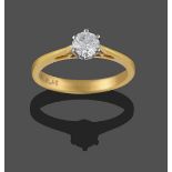 An 18 Carat Gold Diamond Solitaire Ring, the round brilliant cut diamond in a white claw setting, to