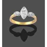 An 18 Carat Gold Diamond Three Stone Ring, the graduated marquise cut diamonds in white rubbed