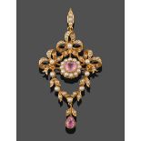 An Edwardian Seed Pearl and Pink Tourmaline Brooch/Pendant, a round cut pink tourmaline in a