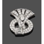 A Diamond Clip Brooch, the scroll motif set throughout with round brilliant cut, eight-cut, and