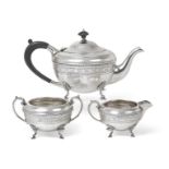 A Three-Piece George V Silver Tea-Service, by Barker Brothers Silver Ltd. Birmingham, The Teapot and
