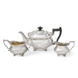 A Three-Piece Edward VII Silver Tea-Service, by Thomas Bradbury, London, 1901, each piece in the