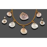A Victorian Shell Necklace, five natural shells suspended from a yellow fine woven chain by lovers