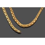 A Fancy Link Necklace, formed of graduated yellow spiga links, length 44cm; and A Fancy Link