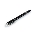 A Montblanc Starwalker Roller-Pen, Numbered IR1538862, the black resin body with white metal mounts,