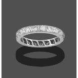 A Diamond Eternity Ring, nineteen round brilliant cut diamonds in white claw settings, total