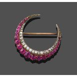 A Ruby and Diamond Crescent Brooch, formed of two rows, one of graduated round cut and oval cut